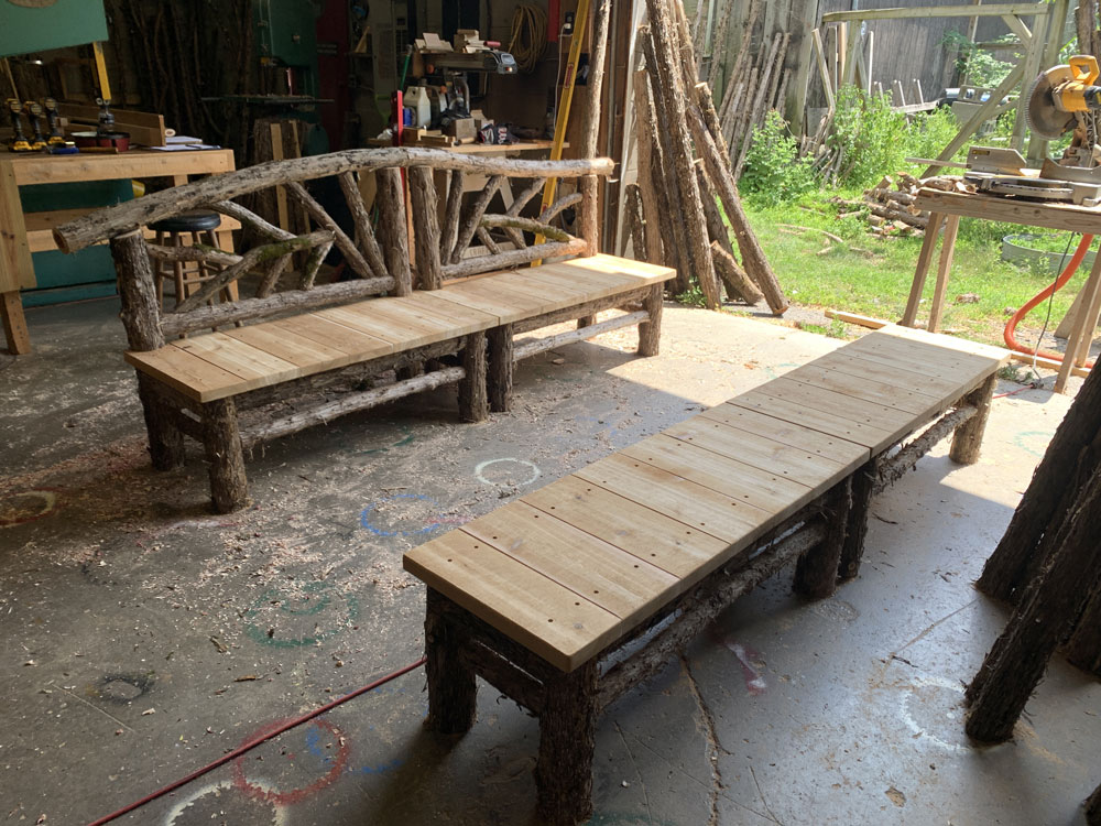 Outdoor rustic benches built for an outdoor table titled the Knapp Benches