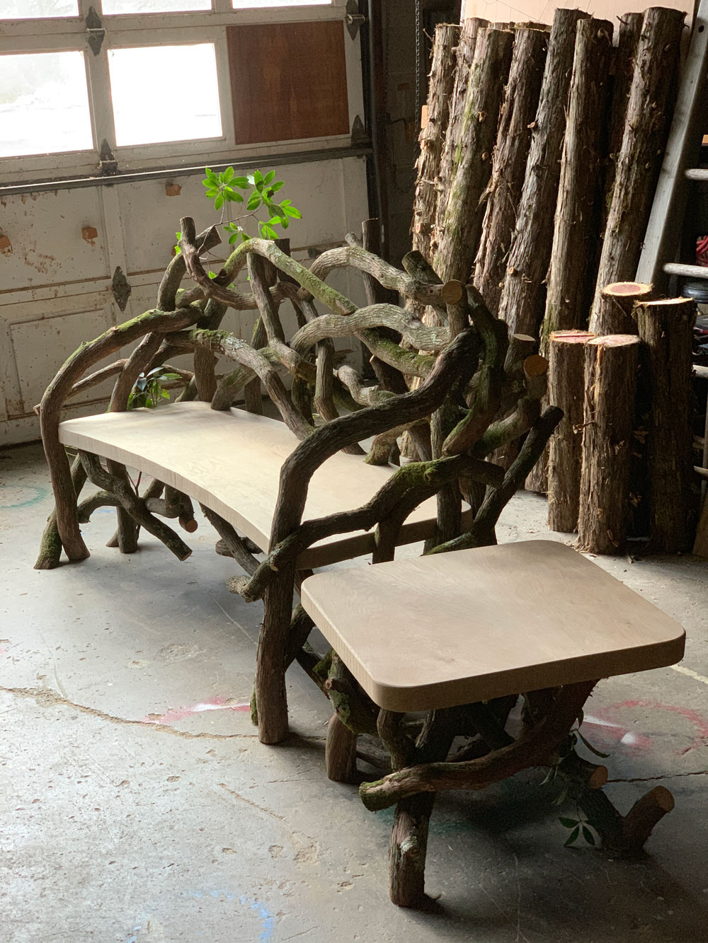 Outdoor rustic park bench built using mountain laurel trees and branches titled the Mountain Laurel Bench & Table Set