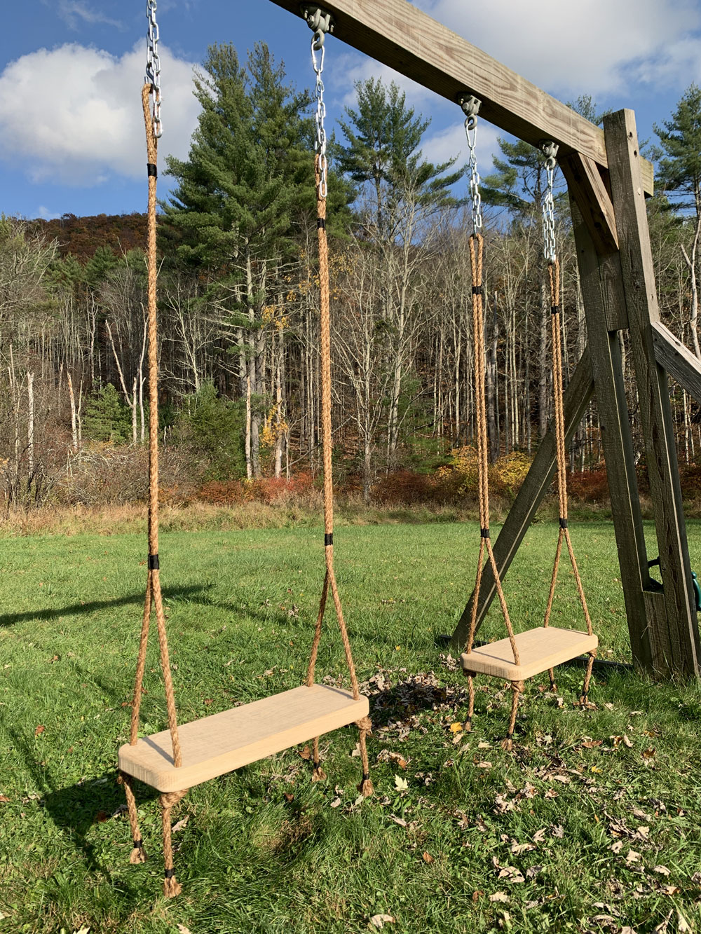 Custom swings built using white oak planks.