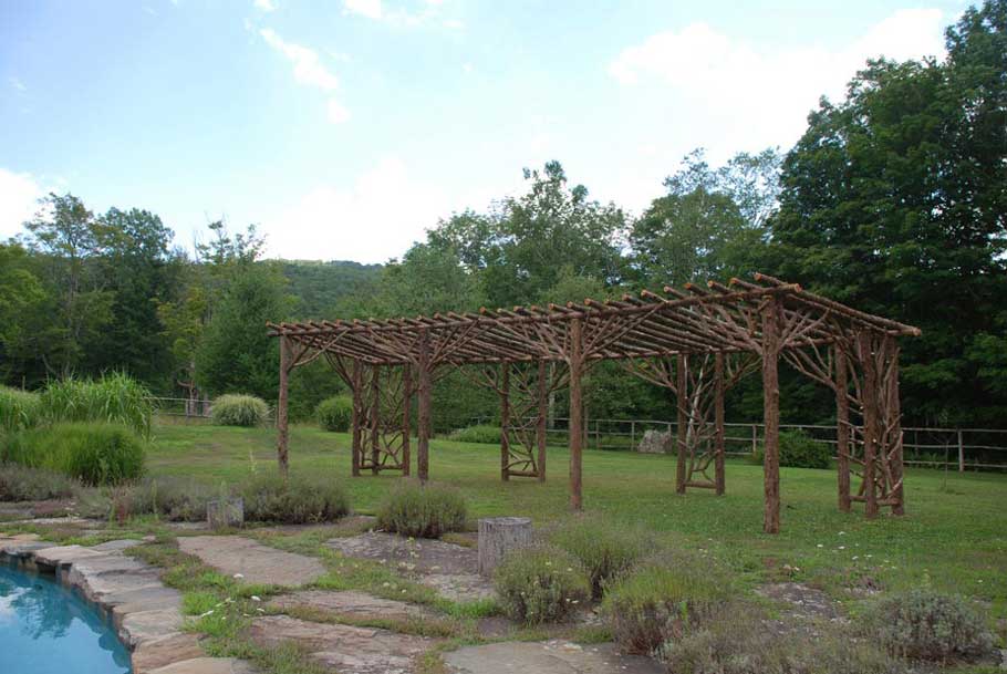 Branchwork rustic pergola constructed using natural materials titled the
