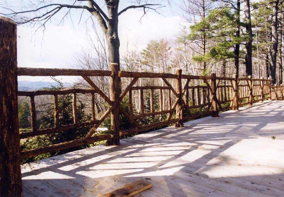 Railings built in the rustic style using logs and branches titled Morris Railings